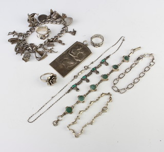 A silver pendant and minor silver jewellery 194 grams 