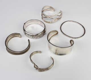 A silver bangle and minor silver jewellery 162 grams