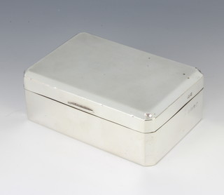 A rectangular silver engine turned cigarette box Birmingham 1953 13cm 
