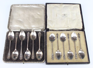 Two cased sets of silver coffee spoons Birmingham 1930 and Sheffield 1932 118 grams