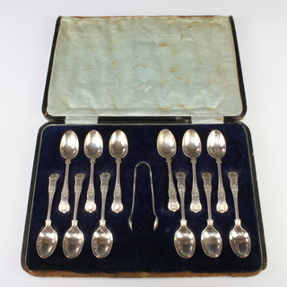 A set of 12 silver Kings Pattern teaspoons and sugar tongs Sheffield 1909 188 grams