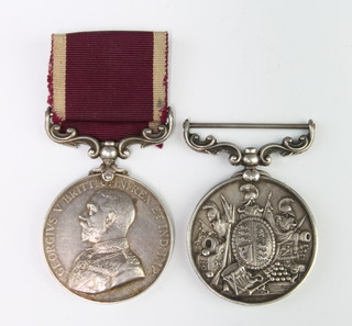 A pair of medals comprising Army Long Service and Good Conduct medal and an Army Meritorious Service medal to 100 Sergt. R.Robinson.R.Innis.Fus. 