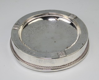 A silver Arts & Crafts style weighted dish/ashtray, Birmingham 1928, 10.5cm 