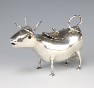 A Continental silver Georgian style cow creamer with gem set eyes, 144 grams, 13cm 