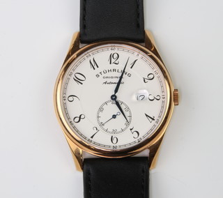 A gentleman's Stuhrling Original automatic calendar wristwatch with leather strap and original box 