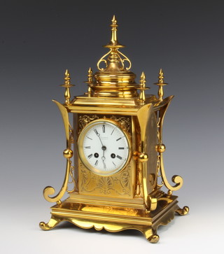 J W Benson, a Victorian French 8 day striking mantel clock with enamelled dial and Roman numerals, contained in a polished gilt metal case 