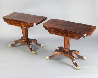 A pair of William IV rosewood D shaped card tables, raised on square columns with triform bases and splayed feet with brass caps and castors 74cm h x 92cm w x 45cm d 