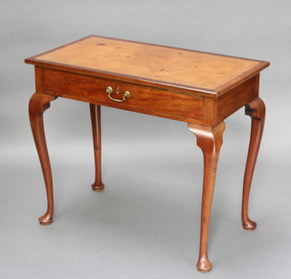 A Georgian rectangular mahogany writing/side table with inset tooled leather writing surface, fitted 1 long drawer, raised on cabriole supports 72cm h x 85cm w x 46cm d 