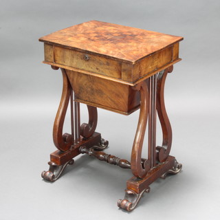 A William IV rectangular inlaid mahogany games/work table, top inlaid a chessboard revealing a well fitted interior, raised on lyre supports with turned H framed stretcher 73cm h x 53cm w x 42cm d 