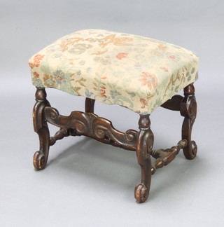 A Jacobean style mahogany framed rectangular stool with upholstered seat and wavy apron, raised on turned supports with H framed stretcher 46cm h x 54cm w x 42cm d  