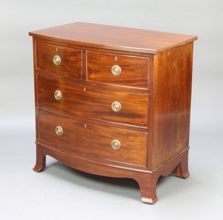 A Georgian style mahogany bow front chest of 2 short and 2 long drawers with brass ring drop handles, raised on splayed bracket feet 77cm h x 76cm w x 47cm d  