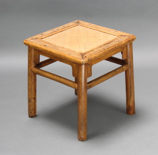 A square Chinese light padauk occasional table with rattan inset to the centre 47cm h x 43cm w x 43cm d 