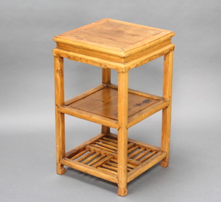 A  Chinese square light padauk 3 tier jardiniere stand raised on square supports 70cm h x 41cm w x 42cm d 