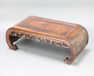 A Chinese rectangular carved padauk coffee table with pierced and carved apron raised on scroll supports 33cm h x 94cm w x 44cm d 