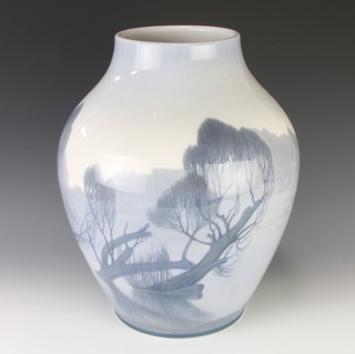 A Royal Copenhagen baluster vase decorated by Arthur Boesen dated 9.4.1918, showing an extensive country landscape with trees and buildings 38cm 