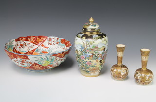 A Noritake oviform vase and cover decorated with figures in an extensive landscape 20cm, a pair of Satsuma baluster vases with tapered necks decorated with figures 12cm and an Imari bowl 26cm 
