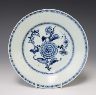 An 18th Century Chinese blue and white shallow dish decorated with flowers from the Tek Sing Treasures auction 21cm 