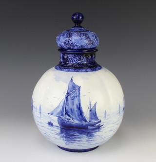 A Royal Worcester blue and white bulbous vase decorated with moored boats, the lid with flowers, 32cm 