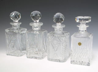 A square spirit decanter and stopper 24cm, do. 25cm, 1 other with octagonal stopper 23cm and 1 with canted corners 24cm 