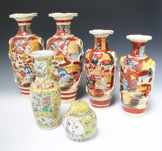 A pair of 1920's Japanese Satsuma vases decorated with figures 38cm, a smaller do. 32cm, 1 other 30cm, a famille rose yellow ground vase 26cm and a yellow ground ginger jar and cover 12cm 
