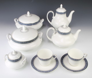 A Royal Doulton Sherbrooke pattern 85009 tea and dinner service comprising 17 tea cups, 6 saucers, tea pot, coffee pot, 2 milk jugs, 2 cream jugs, sugar bowl with lids, 19 small plates, 17 dinner plates, 12 dessert bowls, 12 soup bowls, sandwich plate, 2 meat plates, dish, 4 tureens and covers 