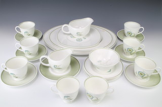 A Susie Cooper Katina C1160 part tea set comprising 8 tea cups, 6 saucers, sugar bowl, milk jug, cream jug, 4 small plates, 1 side plate, sandwich plate and 2 meat plates 