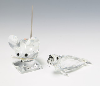 A Swarovski Crystal seal 012261 9cm and a do. of a mouse 010020 4cm 