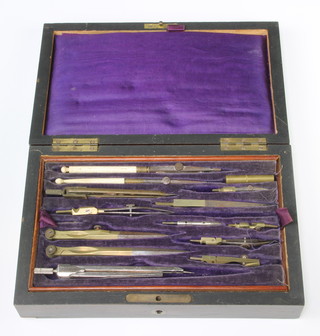 A 19th Century bone, brass and steel part geometry set contained in a rosewood case with hinged lid 