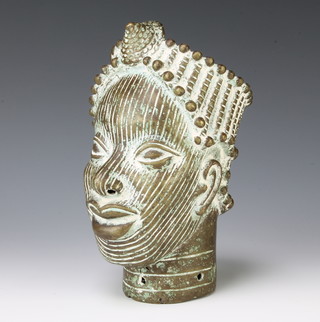 A Benin bronze portrait bust 20cm x 10cm diam. 