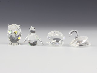 Three Swarovski Crystal animals - baby penguin 3 1/2cm, swan 4cm, owl 4cm and a shell 3cm, boxed 