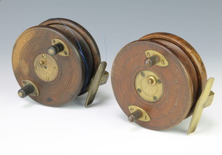 Two vintage wooden and brass star back fishing reels 10cm, both with Diameter and Slater latches  