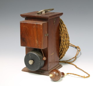 An internal service bell contained in a mahogany case 