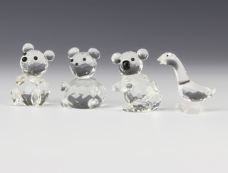 Four Swarovski Crystal figures - bear 4 1/2cm, goose 4 1/2cm, koala bear 4cm and 1 other bear 4cm, all boxed 