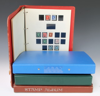 A Stanley Gibbons album of GB mint and used stamps 1902-1967, a stock book of Elizabeth II GB stamps, loose leaf album of stamped envelopes and an empty first day cover album  