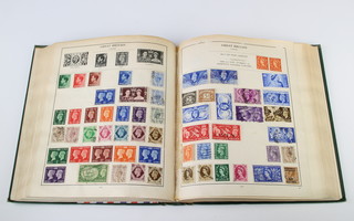 An album of used world stamps including GB, Victoria to Elizabeth II, Japan, India, Holland, Germany, Finland, Czechoslovakia, China, Belgium, etc 