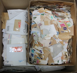 2 boxes containing a large collection of loose stamps