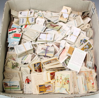 A large collection of cigarette cards including John Players, Wills, Kensitas, etc 