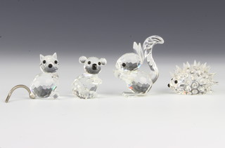 Four Swarovski Crystal animals  - squirrel 5cm, koala bear cub 3cm, kitten 3.5cm and hedgehog 5 cm, all boxed 
