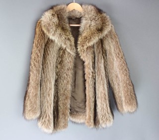 A lady's  quarter length fox fur jacket 