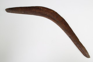 Of Aboriginal interest, a Victorian wooden boomerang 53cm x 6cm w
