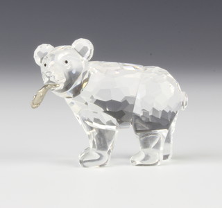 A Swarovski Crystal standing bear with a fish in his mouth 4.5cm, boxed 