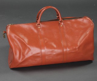 A Louis Vuitton brown leather travel case, the interior marked Louis Vuitton Paris 29cm h x 27cm x 59cm, complete with padlock (no key) 