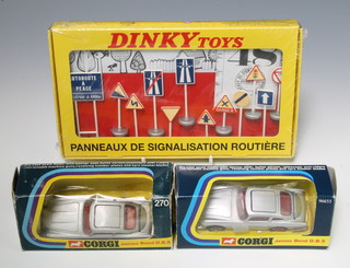 A Corgi 270 James Bond Aston Martin boxed with figure, a Corgi 96655 Aston Martin boxed with certificate, and a set of French Dinky road signs marked Ref 593 