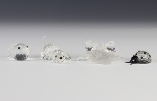 A Swarovski Crystal group of 2 snails on a leaf 4.5cm, a do. fish 3.5cm, a puppy 4.5cm and a ladybird 3cm, boxed