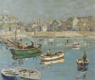**Rowland Fisher (1885-1969) oil on board, harbour scene "Morning Sun St Ives" 44cm x 52cm, label en verso St Ives Society of Artists 
