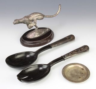 A sterling silver figure of a leopard on a oval socle 18cm, a pair of mounted horn salad servers and a silver dish 