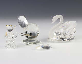 A crystal glass figure  of a swan 9cm, do. mouse 5.5cm and an angel 5cm, boxed 
