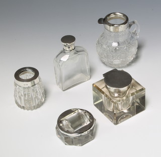 A cut glass oil bottle with silver collar Birmingham 1900 8cm, 2 other mounted items, an Edwardian silver mounted inkwell with glass base London 1908 and a silver mounted stamp moistener