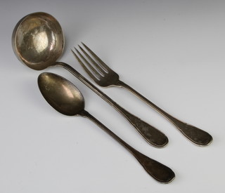 An 800 standard ladle and a serving spoon and fork 451 grams 