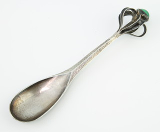 Guild of Handicraft Ltd An Edwardian silver spoon with chrysoprase cabuchon finial designed by Charles Robert Ashbee, London 1903, 14cm, gross 33 grams